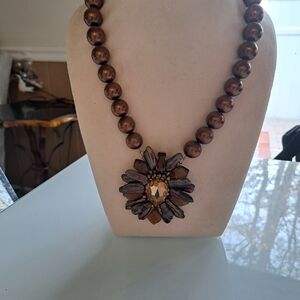 Chic Brown Beaded Necklace with Floral Pendant